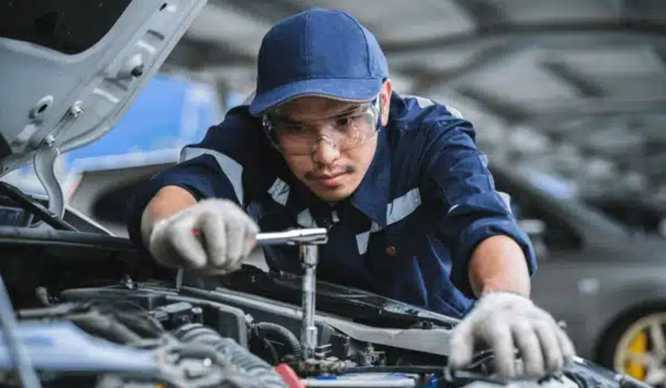 portrait-asian-mechanic-checking-safety-600nw-2180535839